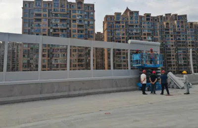 S207 highway elevated bridge noise barrier retrofit featuring reinforced acrylic and micro-perforated metal panels with H-steel posts